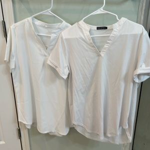 Set of 2 split V neck white ladies short sleeve tops. Like new.